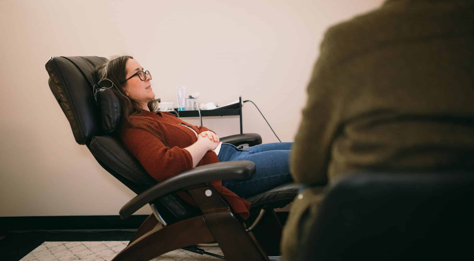 woman receiving neurofeedback therapy