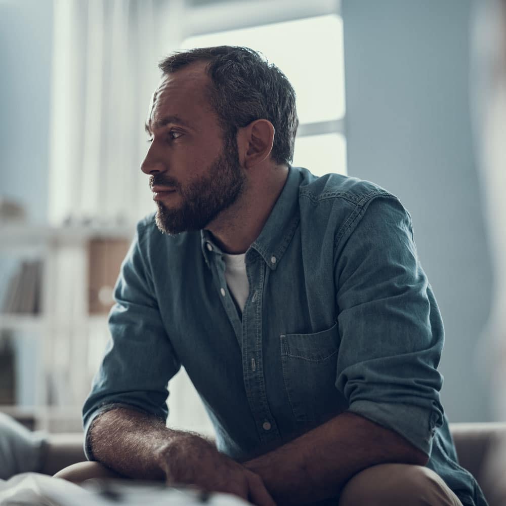 man sitting deep in thought