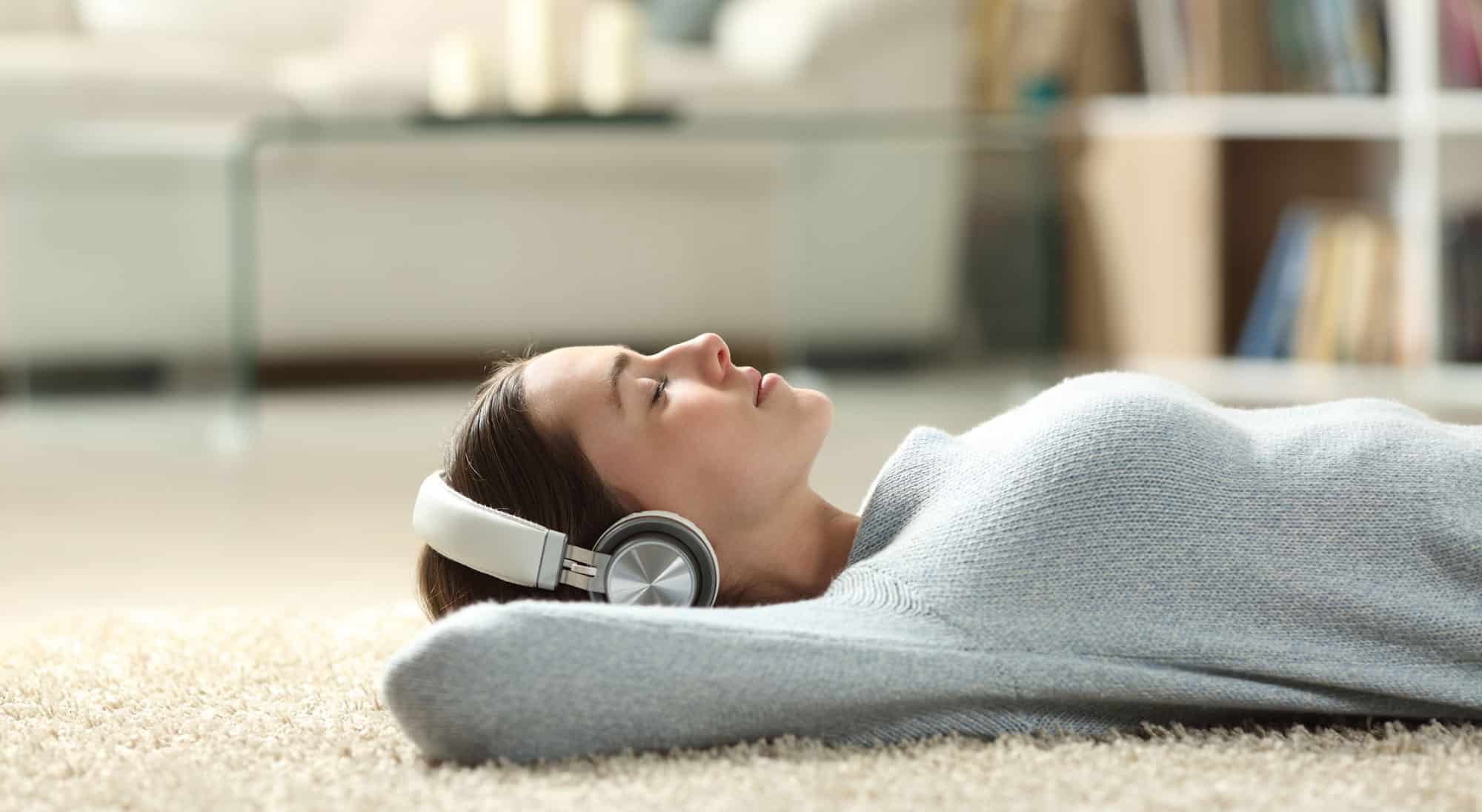 woman relaxing with headphones on