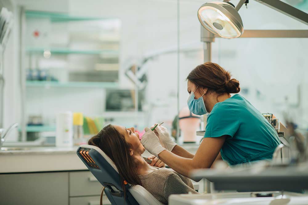 A woman at the dentist